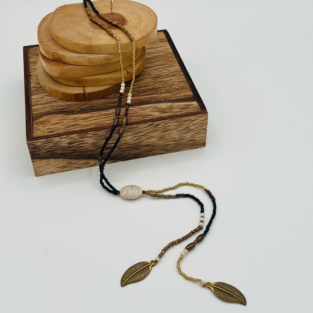 Elegant Gold, Bronze, Black & White Beaded Necklace w/ Leaf Charms 28” Long NEW